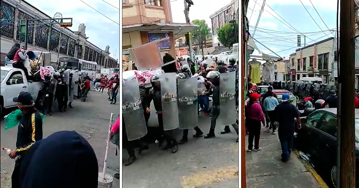Toluca: Se enfrentan comerciantes y policías por un puesto de tacos || VIDEO