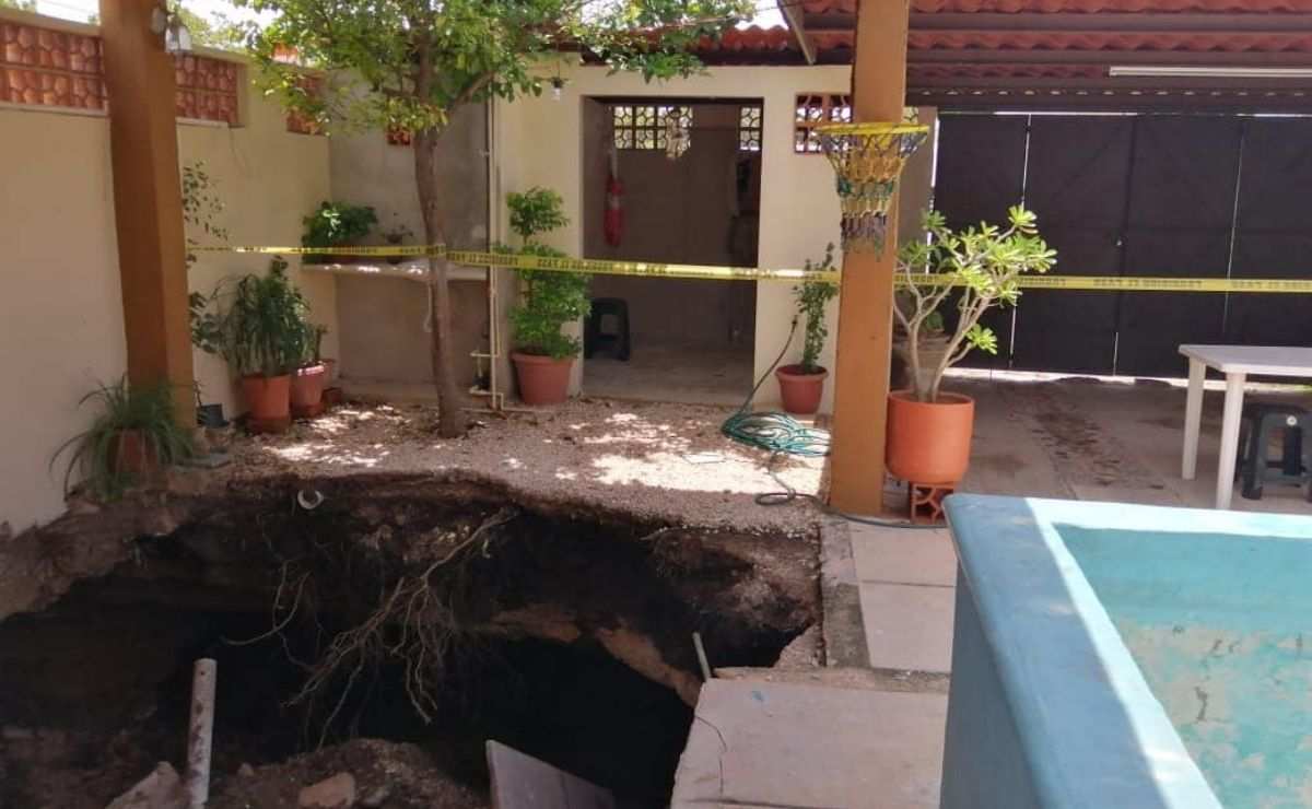 Aparece nuevo socavón en el patio de una casa en Yucatán